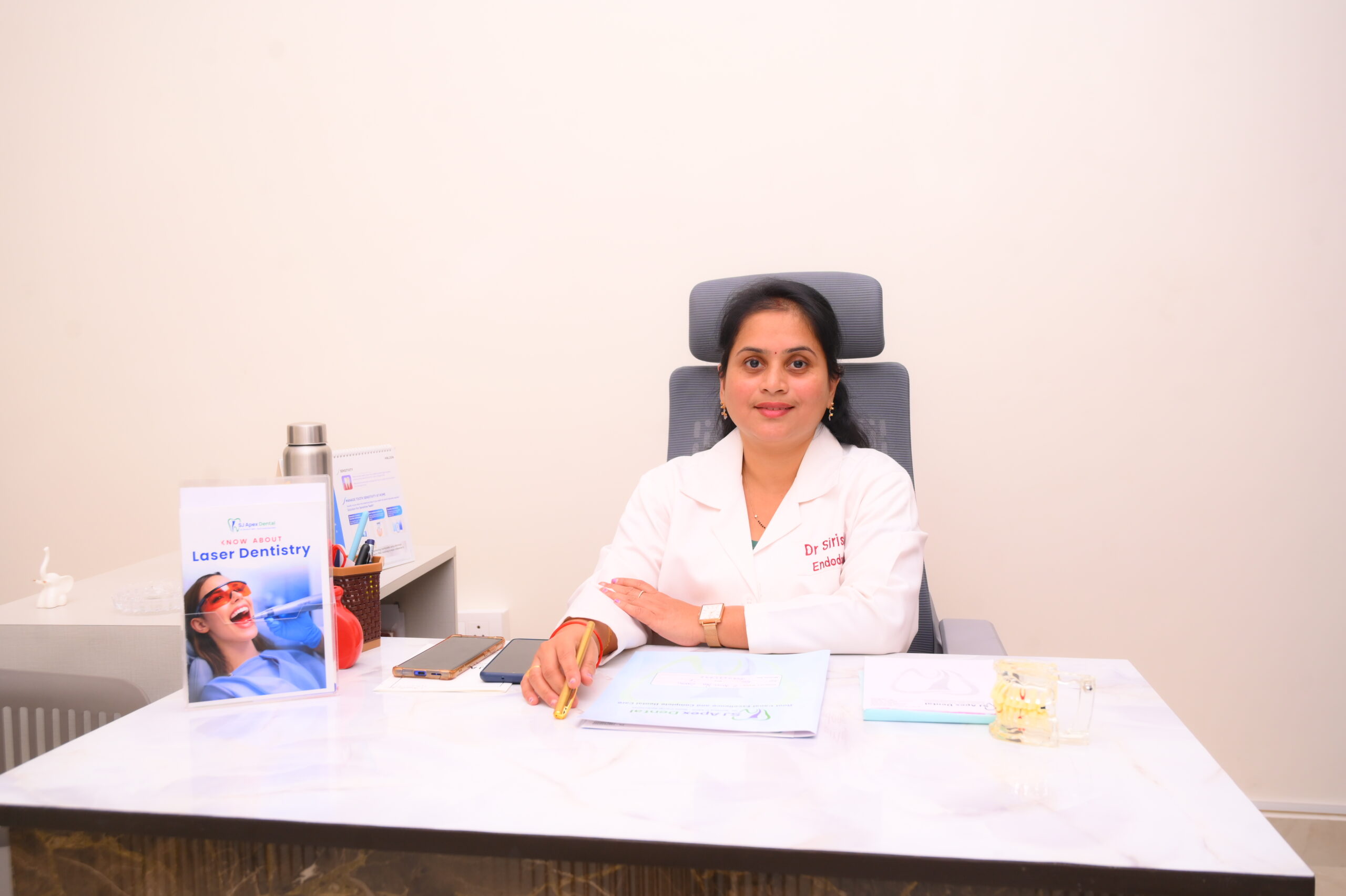 Dr. Sirisha P MDS at consultation desk